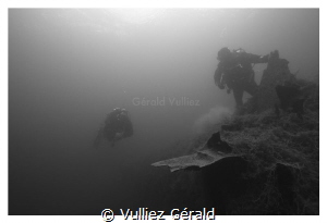 Diver in cold water by Vulliez Gérald 